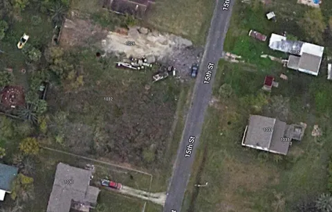 a view of a yard with an outdoor space