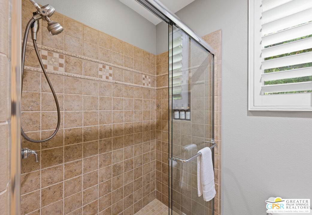 80592 Apricot Lane Indio, CA 92201 - Photo 22 of 45 a bathroom with a shower