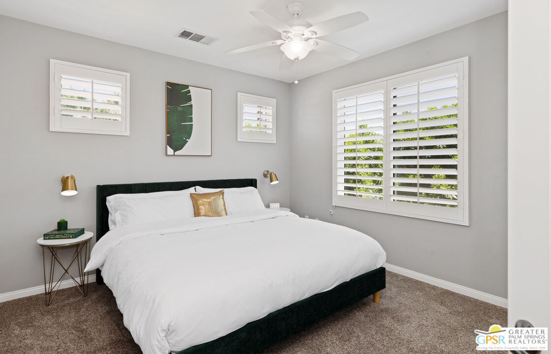 80592 Apricot Lane Indio, CA 92201 - Photo 29 of 45 a large bed sitting in a bedroom next to a window