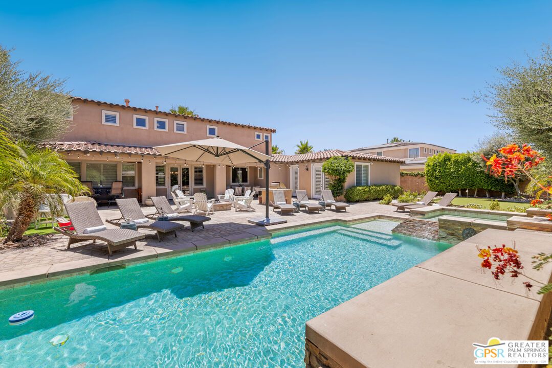 80592 Apricot Lane Indio, CA 92201 - Photo 38 of 45 a swimming pool with outdoor seating and yard