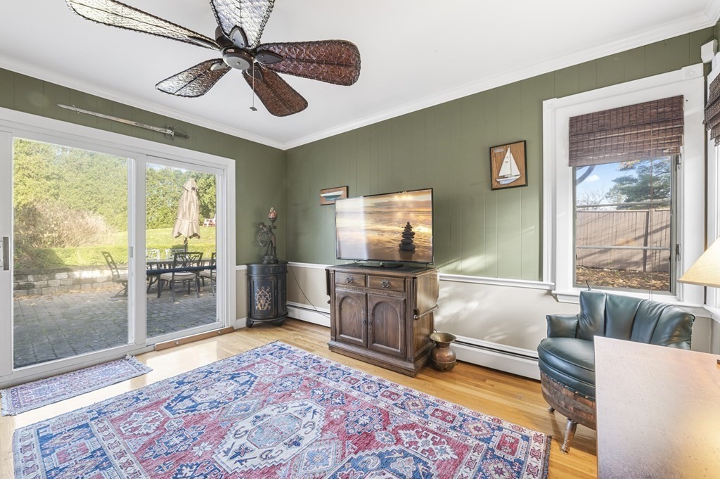 5 Colgate Road Marblehead, MA 01945 - Photo 19 of 36 a living room with furniture and a flat screen tv