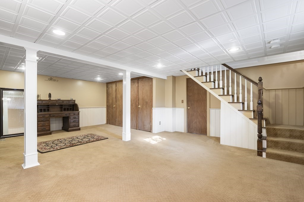 5 Colgate Road Marblehead, MA 01945 - Photo 29 of 36 a view of a hallway with staircase