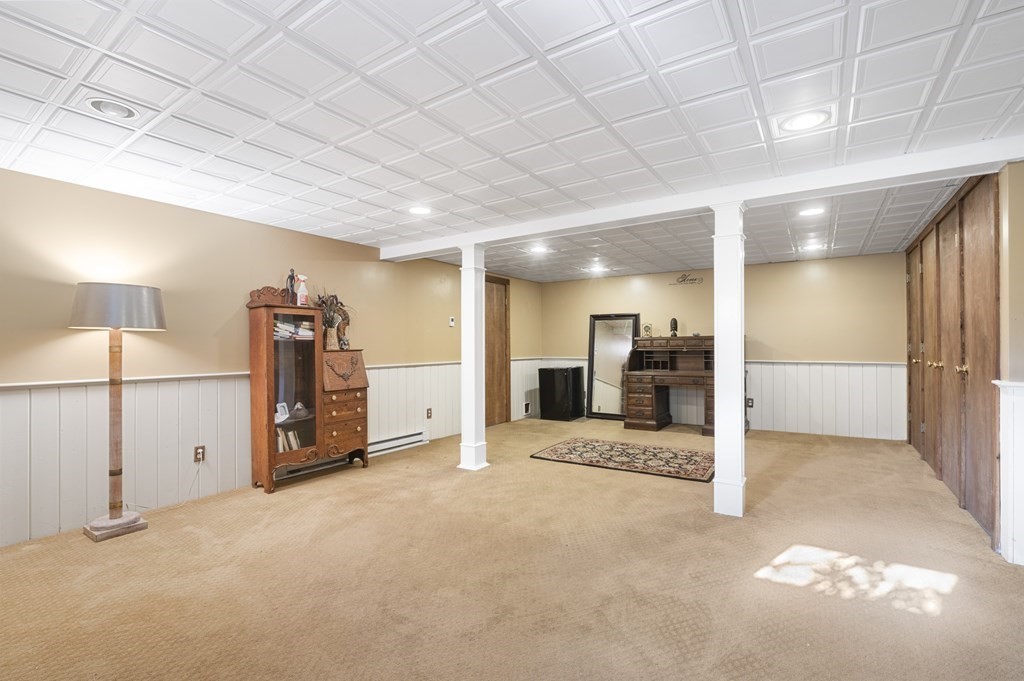 5 Colgate Road Marblehead, MA 01945 - Photo 30 of 36 a view of a hallway with a refrigerator and a sink