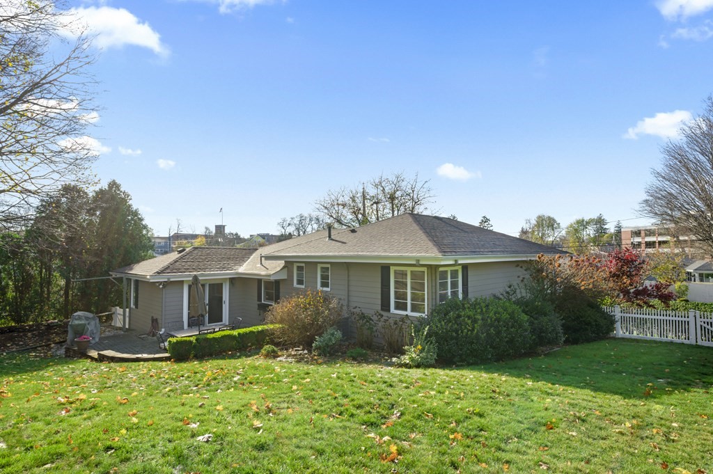 5 Colgate Road Marblehead, MA 01945 - Photo 33 of 36 a front view of a house with a garden
