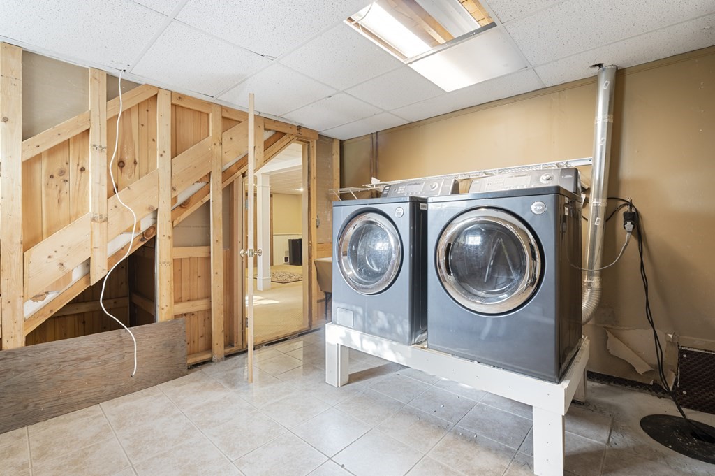 5 Colgate Road Marblehead, MA 01945 - Photo 35 of 36 a view of a storage & utility room with washer and dryer