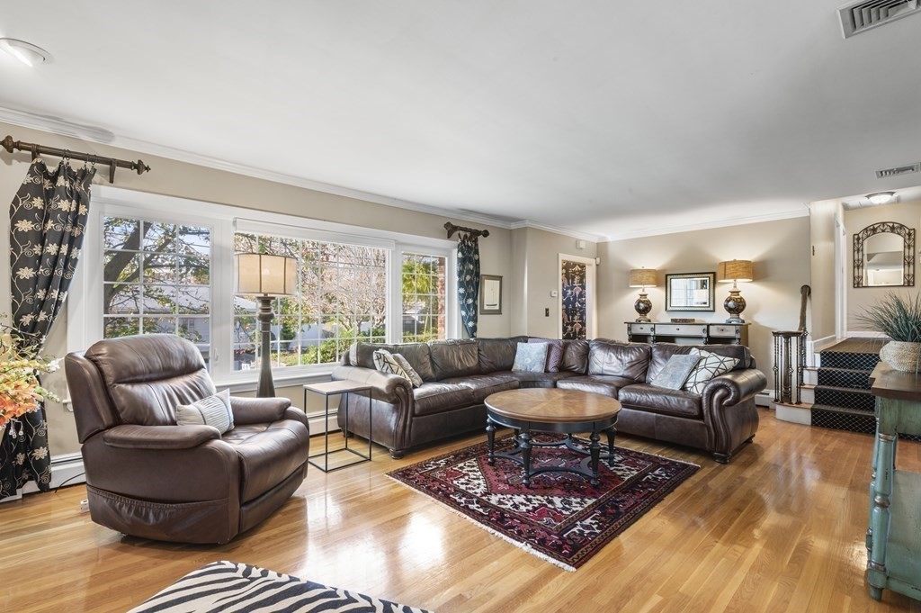 5 Colgate Road Marblehead, MA 01945 - Photo 5 of 36 a living room with furniture wooden floor and a large window
