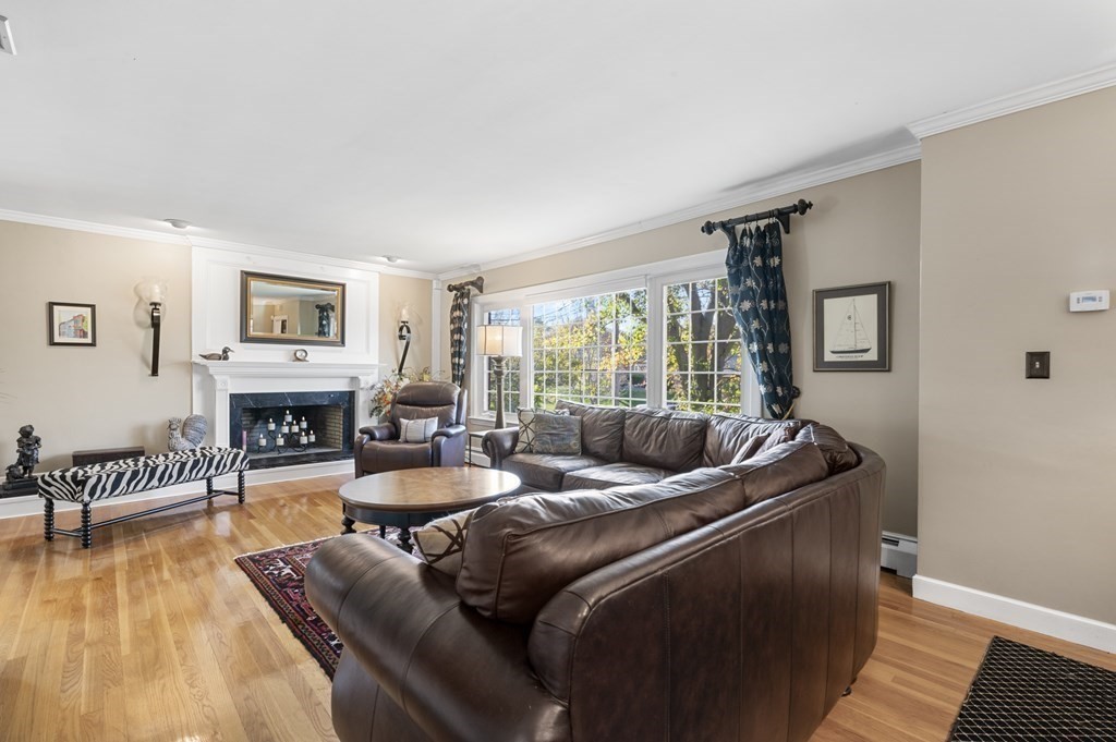 5 Colgate Road Marblehead, MA 01945 - Photo 6 of 36 a living room with furniture and a fireplace