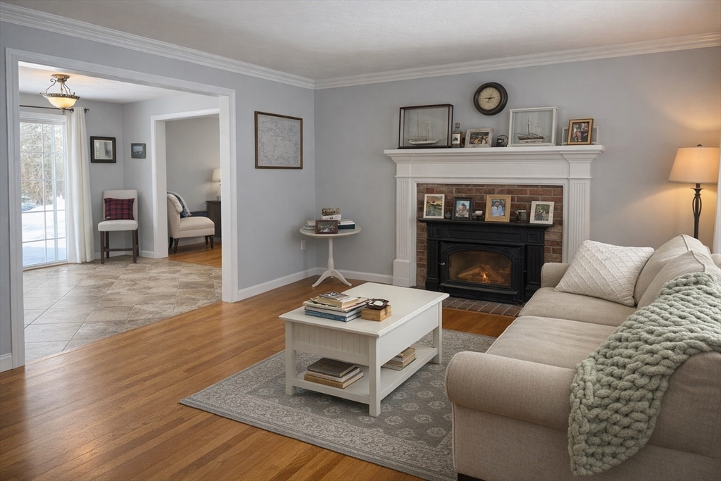 11 Trout Farm Way Wareham, MA 02576 - Photo 2 of 24 a living room with furniture and a fireplace