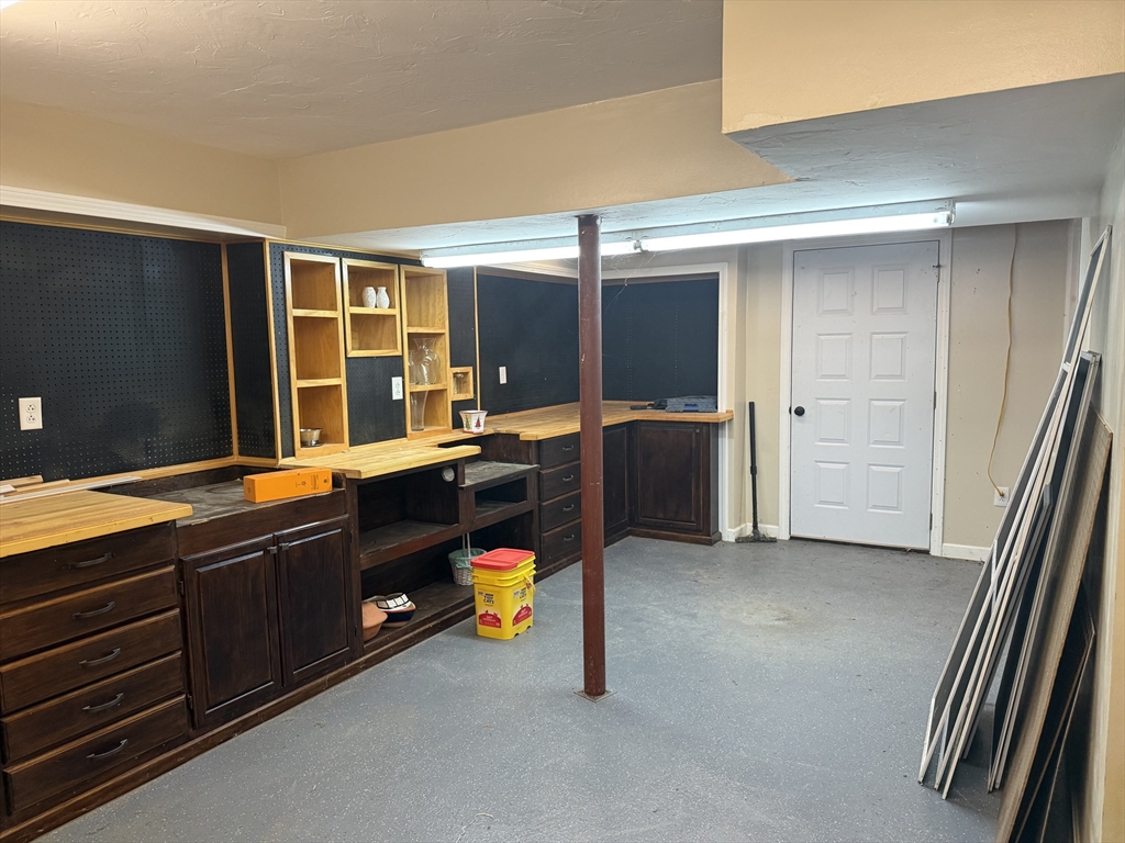11 Trout Farm Way Wareham, MA 02576 - Photo 22 of 24 wooden floor in kitchen and windows