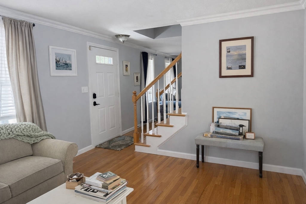 11 Trout Farm Way Wareham, MA 02576 - Photo 3 of 24 a living room with furniture and a wooden floor