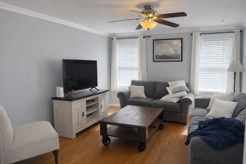 11 Trout Farm Way Wareham, MA 02576 - Photo 4 of 24 a living room with furniture and a flat screen tv