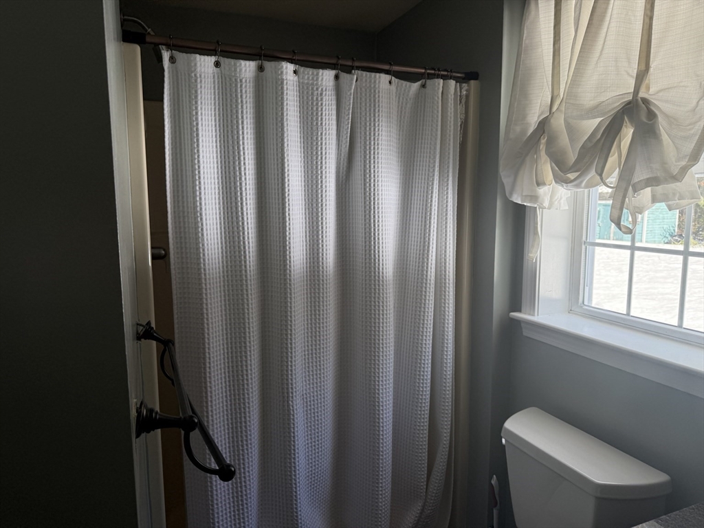 11 Trout Farm Way Wareham, MA 02576 - Photo 10 of 24 a bathroom with a toilet and a window