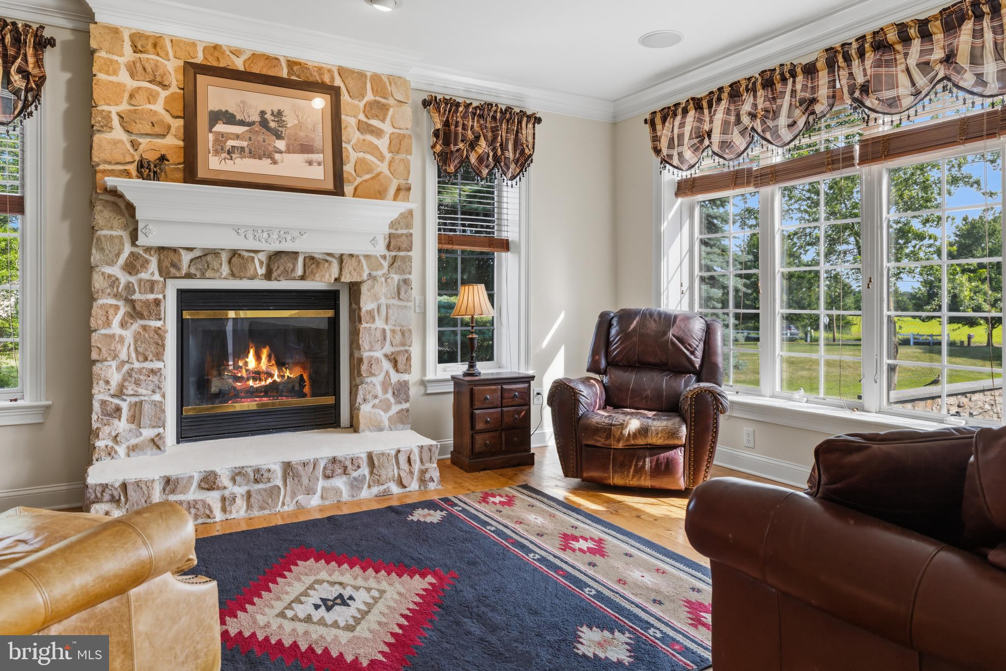 265 Walter Road Chalfont, PA 18914 - Photo 11 of 83 Formal living room with stone gas fireplace