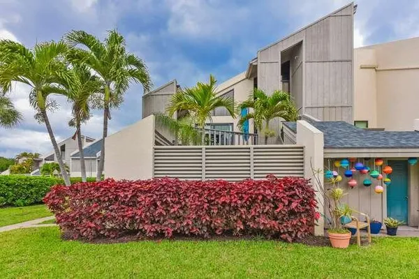 a view of a house with a garden