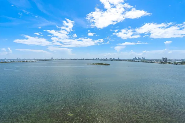 a view of a lake and a city