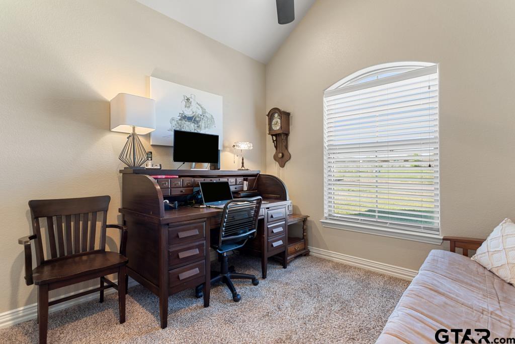 706 Duke Place Tyler, TX 75704 - Photo 20 of 33 a view of a workspace with furniture and a window
