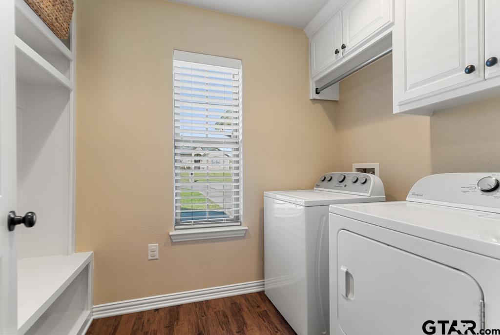 706 Duke Place Tyler, TX 75704 - Photo 22 of 33 a view of storage and utility room with washer and dryer