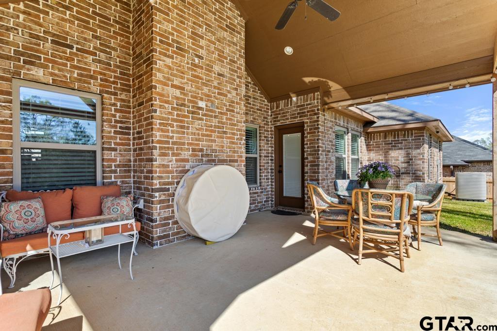 706 Duke Place Tyler, TX 75704 - Photo 24 of 33 a building outdoor space with patio furniture and potted plants