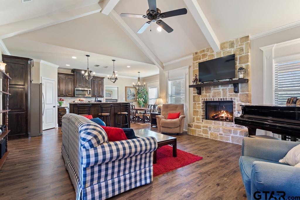 706 Duke Place Tyler, TX 75704 - Photo 3 of 33 a living room with furniture fireplace and flat screen tv