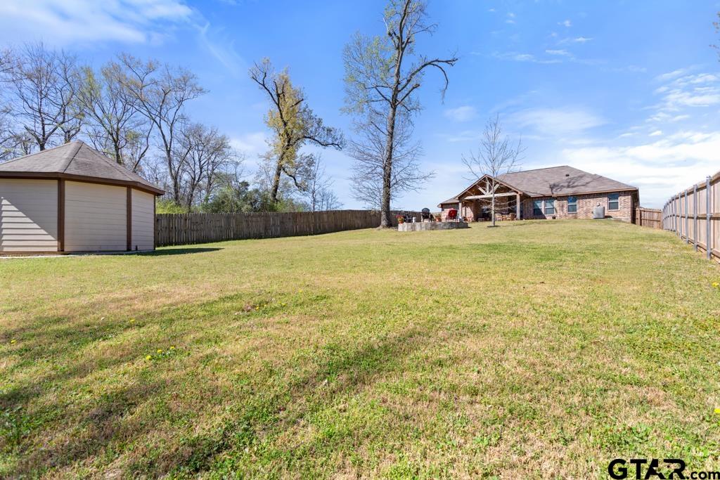 706 Duke Place Tyler, TX 75704 - Photo 31 of 33 a view of a street with a building in the background