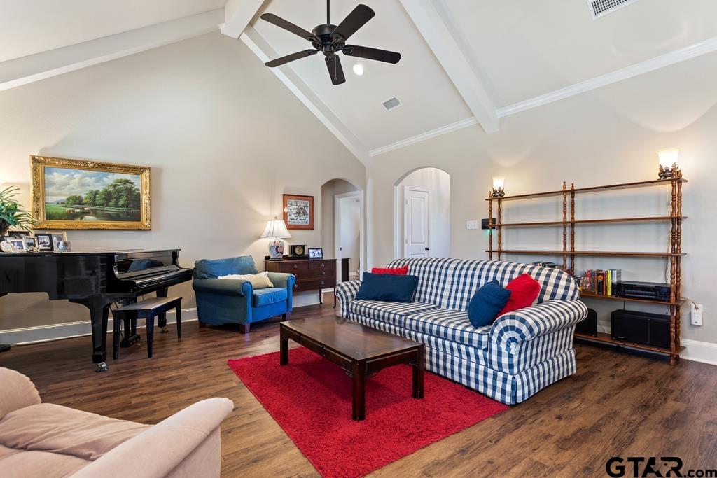 706 Duke Place Tyler, TX 75704 - Photo 4 of 33 a living room with furniture a rug and a window
