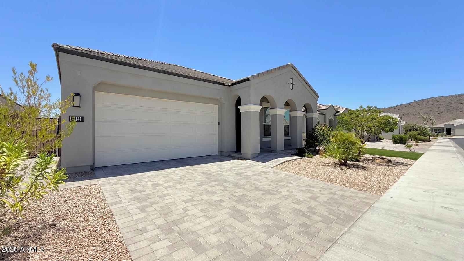 2141 East Alameda Road Phoenix, AZ 85024 - Photo 3 of 15 a front view of a house with a yard