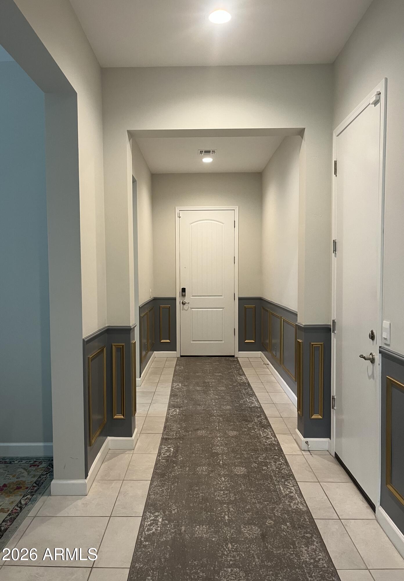 2141 East Alameda Road Phoenix, AZ 85024 - Photo 4 of 15 a view of a hallway with wooden cabinets