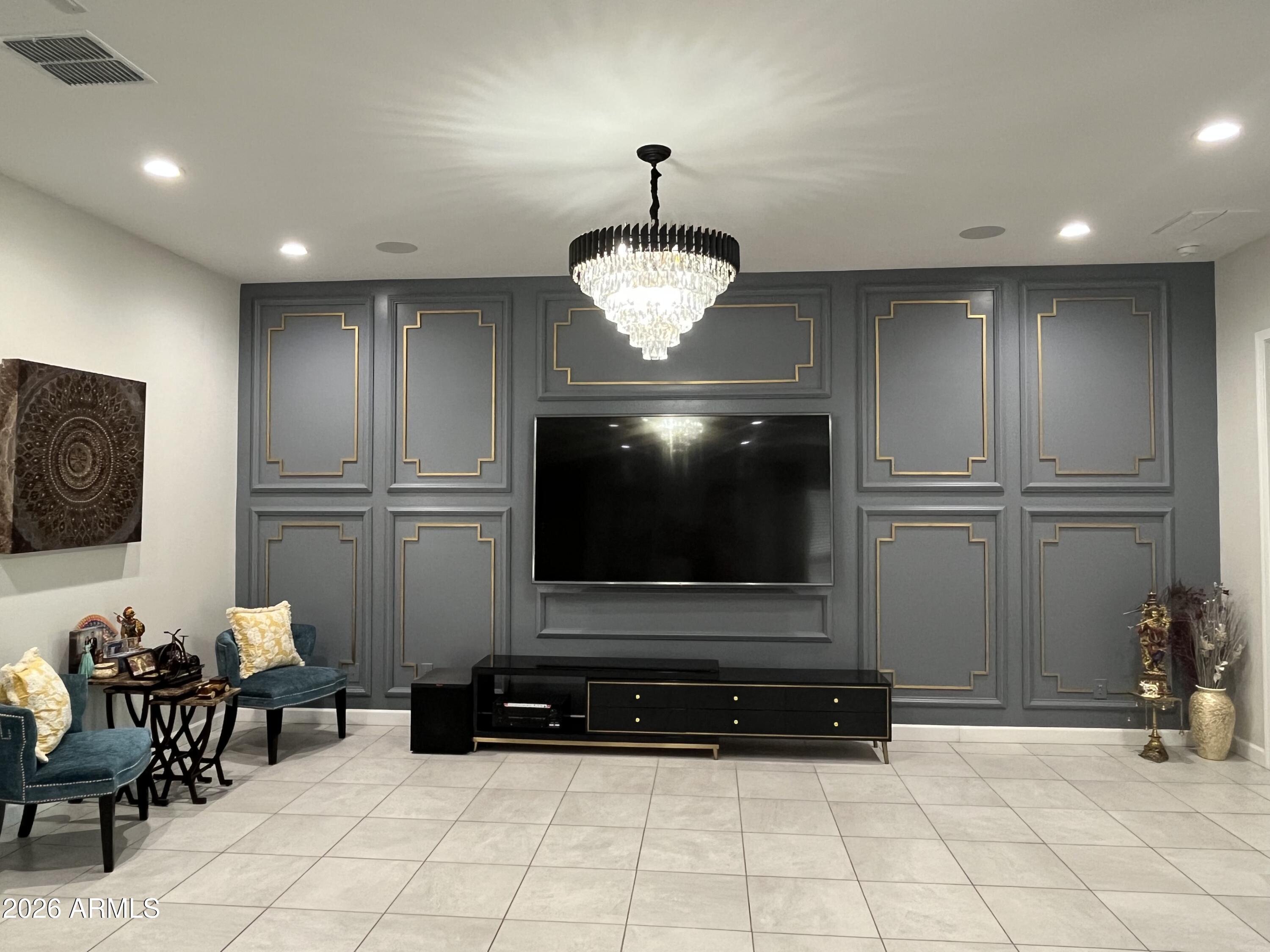 2141 East Alameda Road Phoenix, AZ 85024 - Photo 5 of 15 a living room with furniture and a flat screen tv