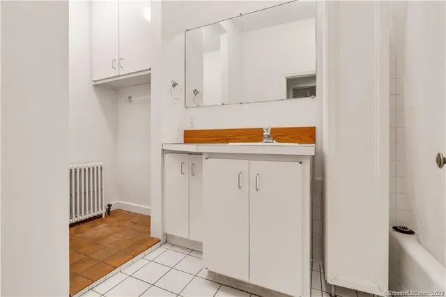 a view of a kitchen with wooden floor