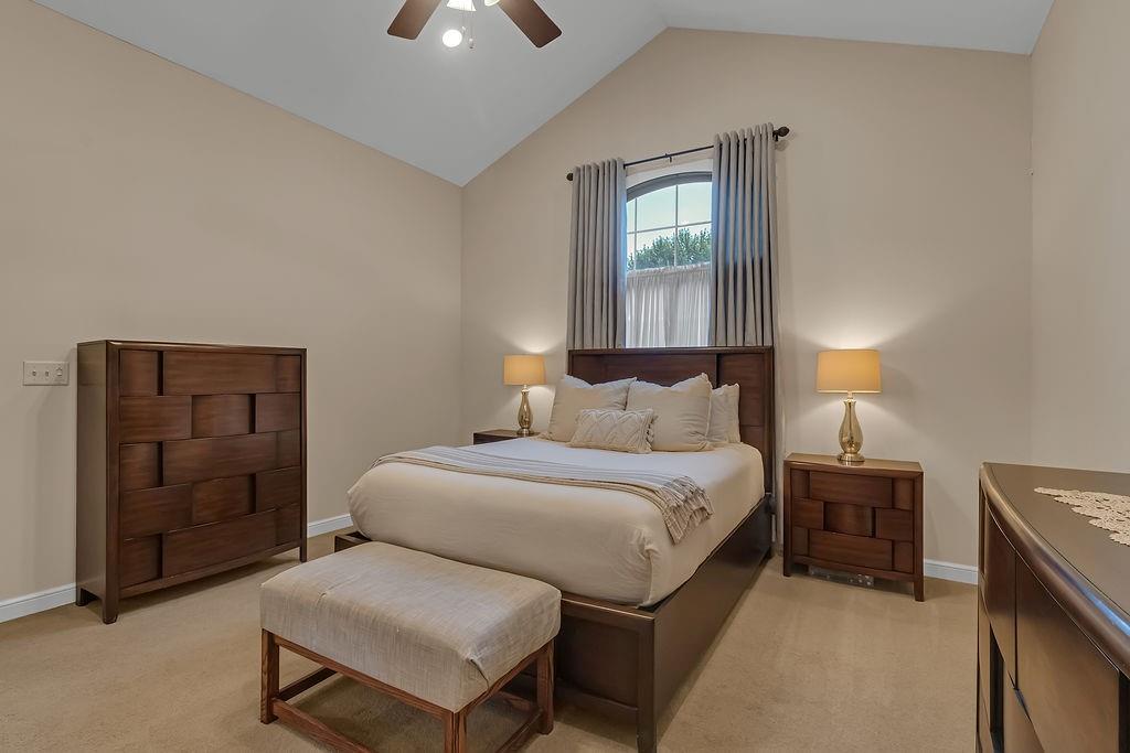 930 Cleland Mill Road New Castle, PA 16102 - Photo 8 of 29 a bedroom with a bed and a lamp