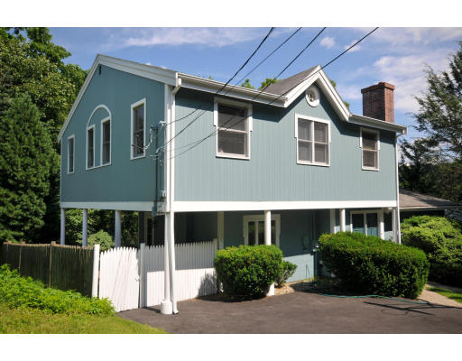 18 Dorr Road Newton, MA 02458 - Photo 1 of 1 a front view of a house with a yard