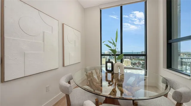 a view of a dining room with furniture