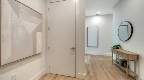 a terrace with outdoor seating and city view