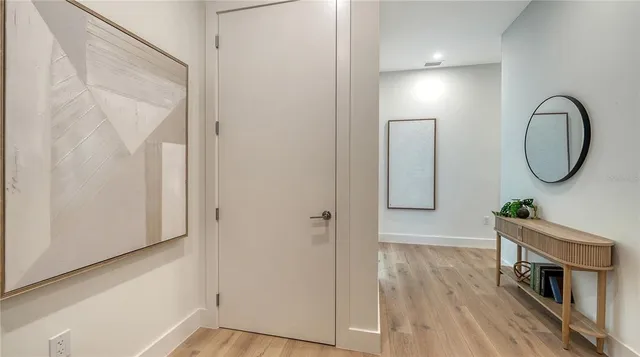 a terrace with outdoor seating and city view