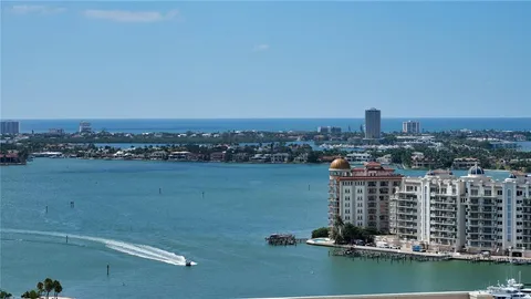 a view of a lake with a big yard