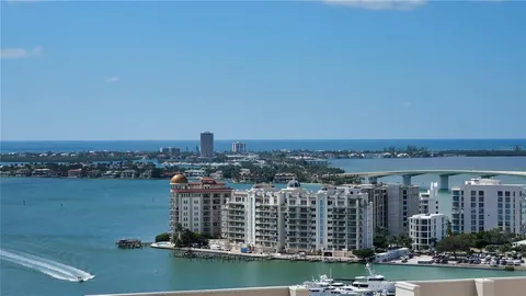 a view of a city with tall buildings