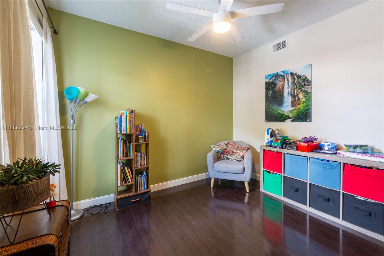 Doral Doral, FL 33178 - Photo 4 of 25 a view of a room with toys and wooden floor