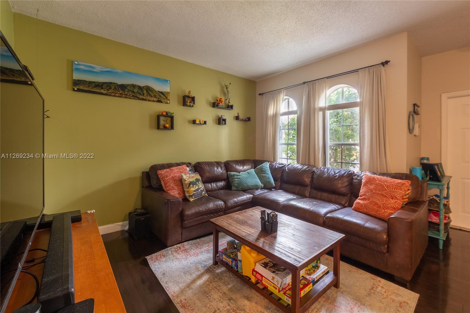 Doral Doral, FL 33178 - Photo 7 of 25 a living room with furniture and a window