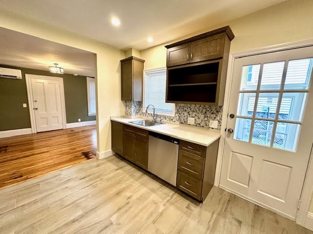 37 Gordon Street, Unit 1 Waltham, MA 02453 - Photo 3 of 12 a bathroom with a double vanity sink and a large mirror