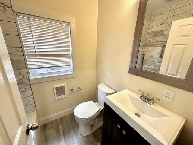 37 Gordon Street, Unit 1 Waltham, MA 02453 - Photo 5 of 12 a bathroom with a sink and a toilet