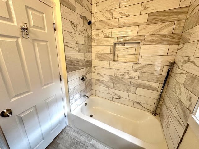 37 Gordon Street, Unit 1 Waltham, MA 02453 - Photo 6 of 12 a bathroom with a bathtub