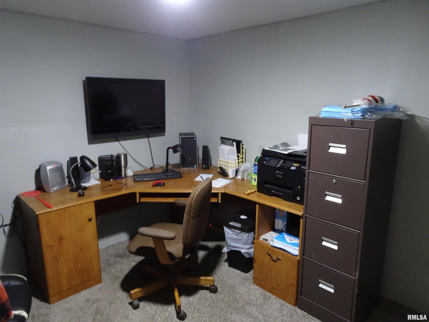 26004-2000 County Road North Annawan, IL 61234 - Photo 11 of 17 a view of a workspace with furniture and wooden floor