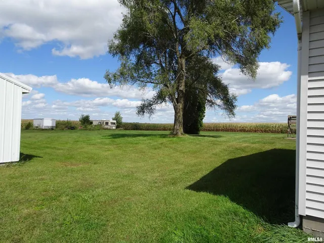 a view of an outdoor space and a yard