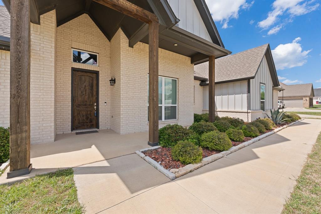 1001 Resolute Road Millsap, TX 76066 - Photo 4 of 40 a view of a back yard of the house