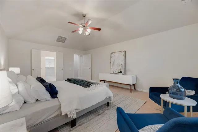 an empty room with windows and entrance