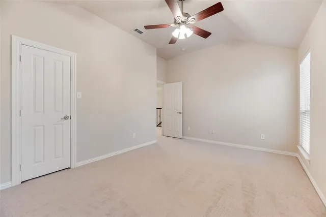 a view of an outdoor space and basketball court