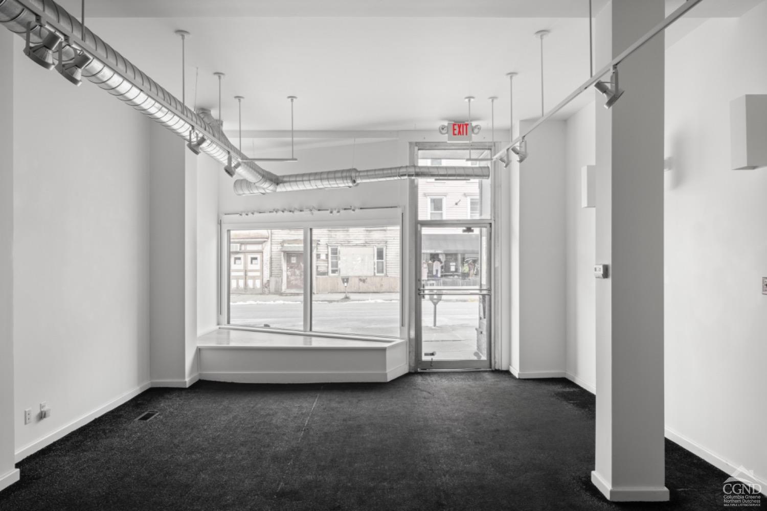 355 Warren Street Hudson, NY 12534 - Photo 4 of 16 a view of an empty room with a window