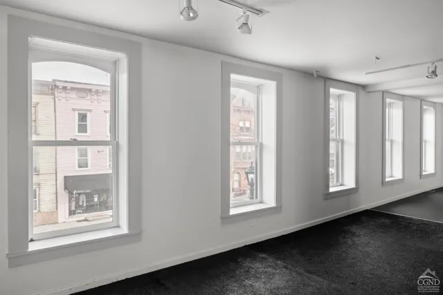 an empty room with windows