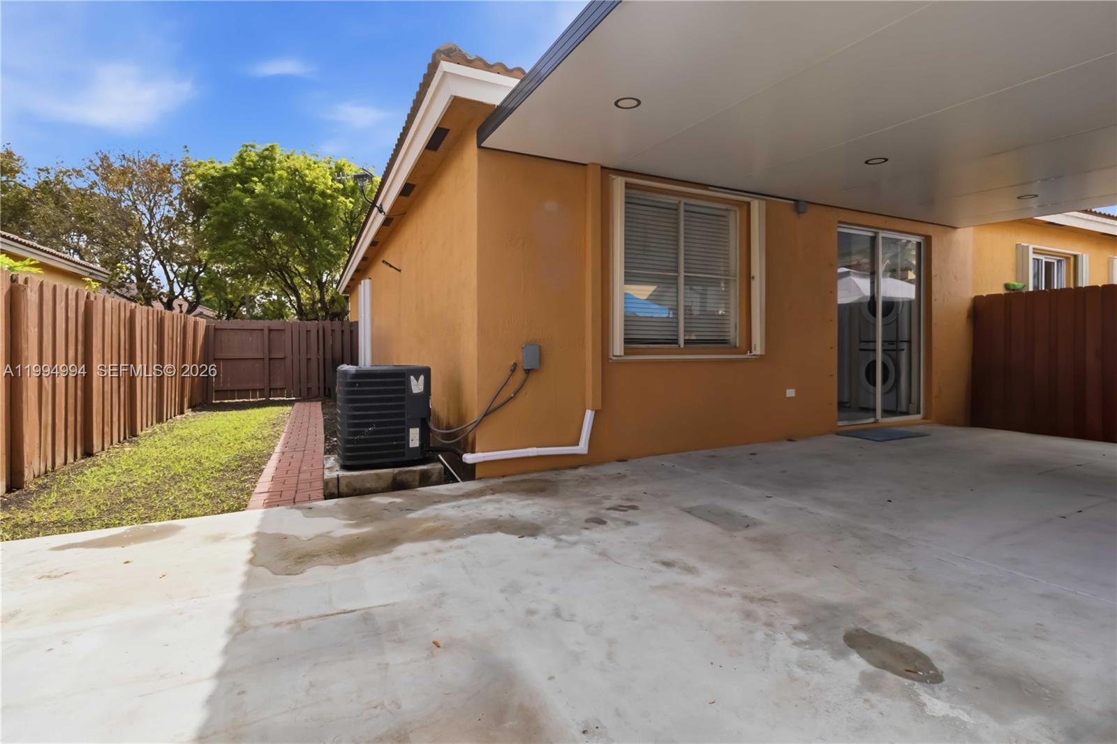 64 Southwest 15th Terrace Homestead, FL 33030 - Photo 22 of 26 a view of backyard with green space