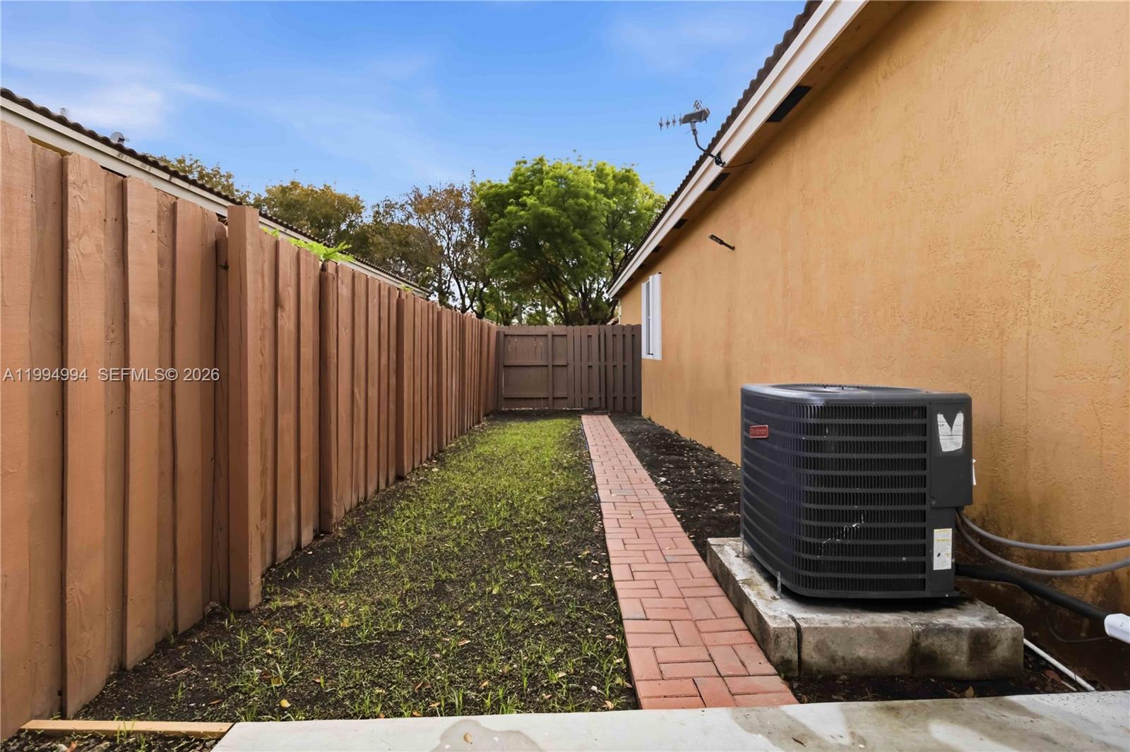 64 Southwest 15th Terrace Homestead, FL 33030 - Photo 23 of 26 a view of deck with wooden floor and outdoor space